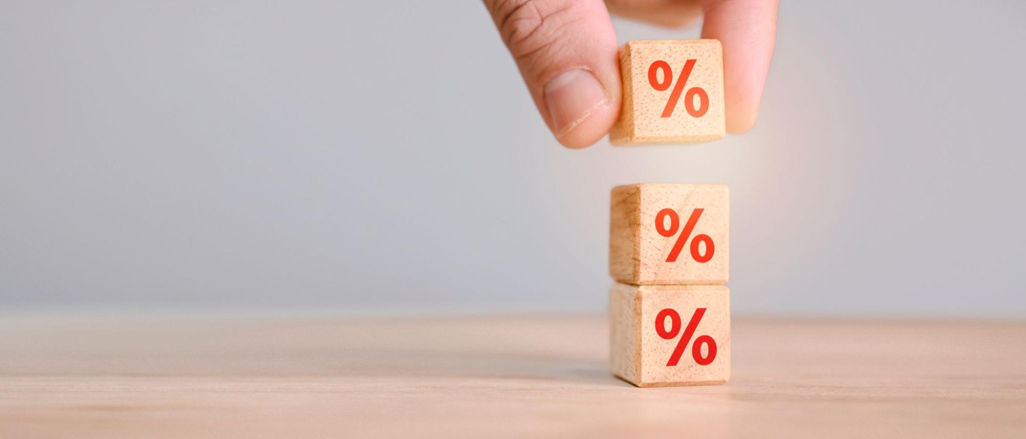 Blocks with % sign being stacked on top of each other.