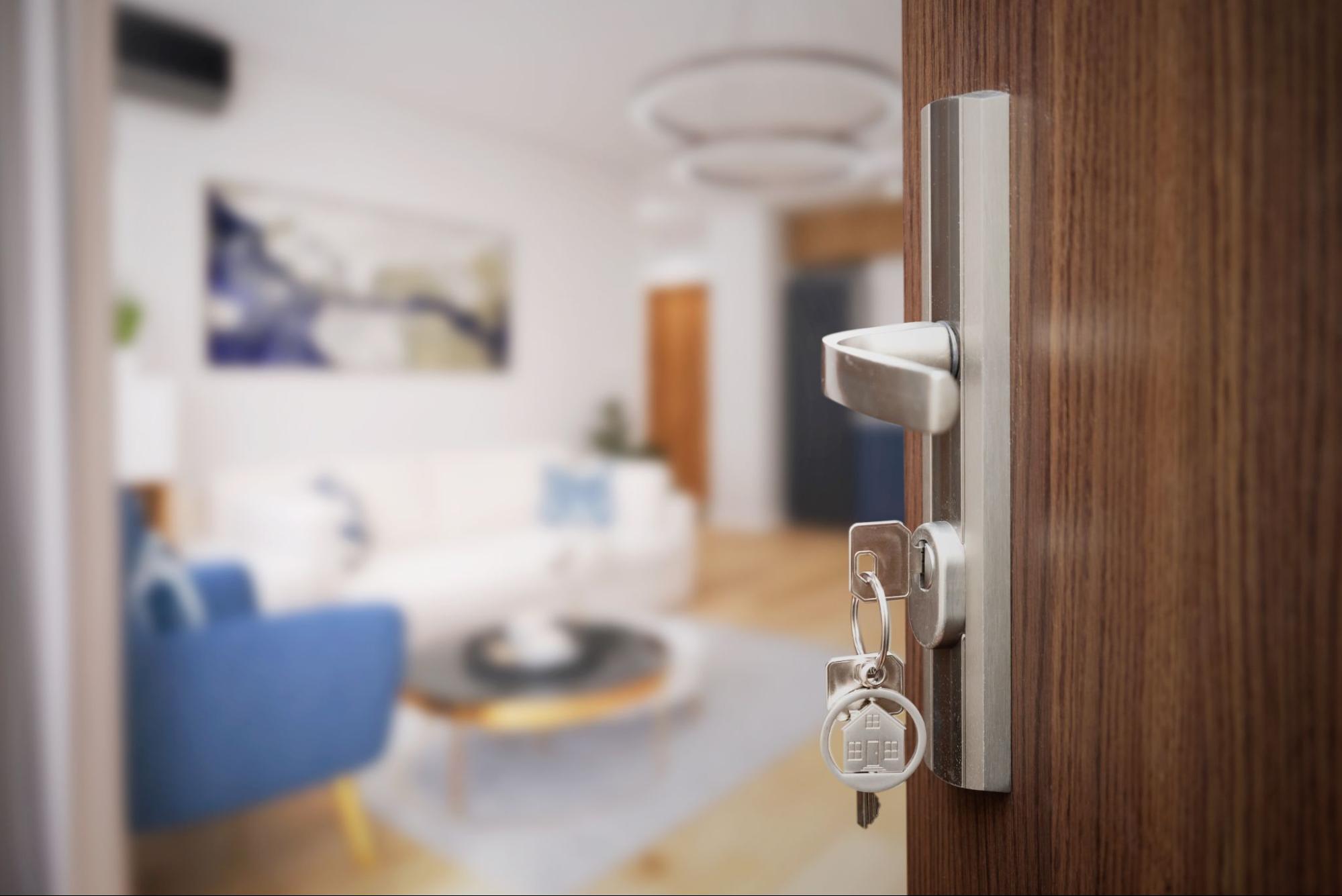 Keys in the door of a rental property. 